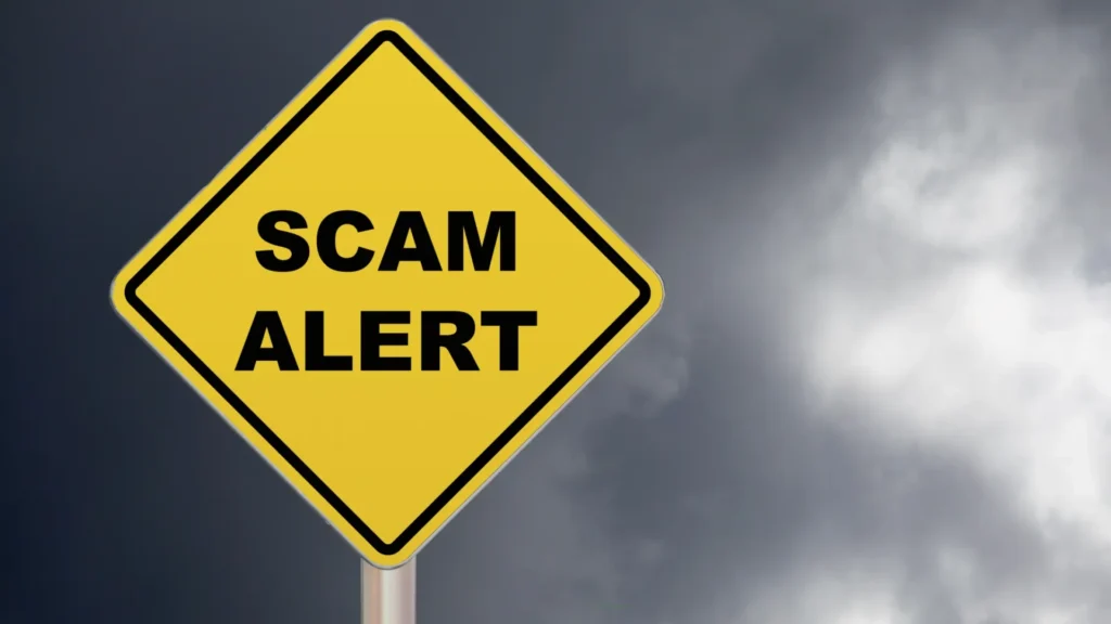 Photo showing a Scam Alert sign - supports the article on How to Buy Land Near Nairobi Safely